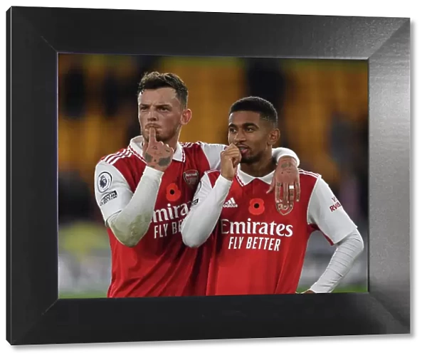 Arsenal's Ben White and Reiss Nelson: Celebrating Victory Over Wolverhampton Wanderers in the 2022-23 Premier League
