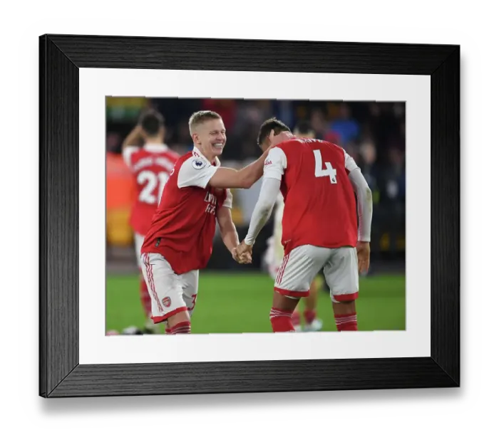 Framed Print : Arsenal's Hard-Fought Victory: Zinchenko and White Celebrate against Wolverhampton Wanderers (November 2022)