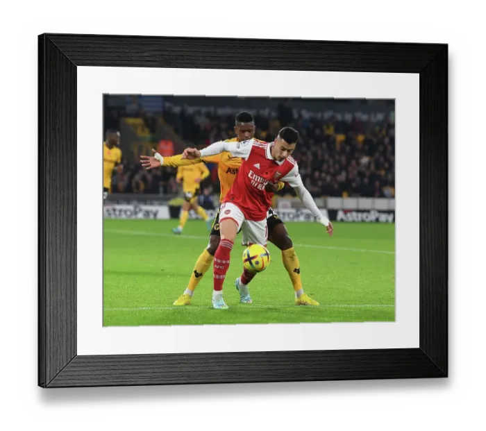 Framed Print : Martinelli Stands Firm: Arsenal's Determined Battle at Molineux against Wolverhampton Wanderers, Premier League 2022-23