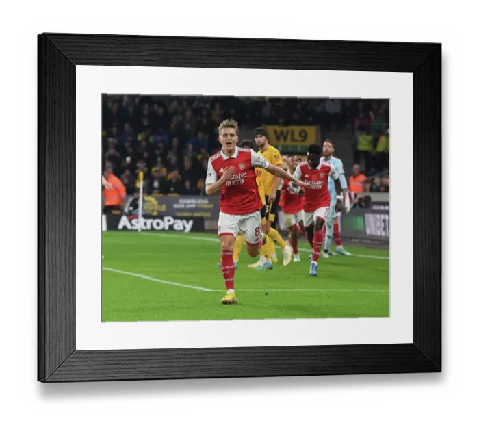 Framed Print : Martin Odegaard Scores First Arsenal Goal: Arsenal Triumph Over Wolverhampton Wanderers in Premier League 2022-23 Framed Print : Martin Odegaard Scores First Arsenal Goal: Arsenal Triumph Over Wolverhampton Wanderers in Premier League 2022-23