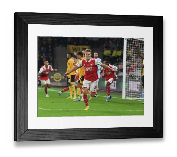 Framed Print : Martin Odegaard Scores First Arsenal Goal: Arsenal's Triumph Over Wolverhampton Wanderers in the 2022-23 Premier League