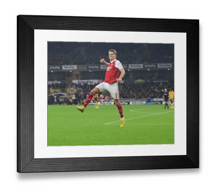 Framed Print : Martin Odegaard Scores First Arsenal Goal: Arsenal Secures Victory Over Wolverhampton Wanderers in Premier League 2022-23 Framed Print : Martin Odegaard Scores First Arsenal Goal: Arsenal Secures Victory Over Wolverhampton Wanderers in Premier League 2022-23