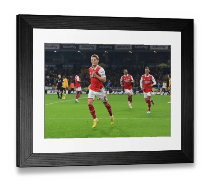 Framed Print : Martin Odegaard Scores First Arsenal Goal: Arsenal's Triumph Over Wolverhampton Wanderers in the 2022-23 Premier League