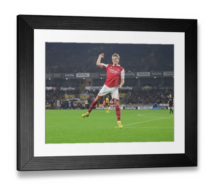 Framed Print : Martin Odegaard Scores First Arsenal Goal: Arsenal Secure Victory Over Wolverhampton Wanderers in Premier League 2022-23 Framed Print : Martin Odegaard Scores First Arsenal Goal: Arsenal Secure Victory Over Wolverhampton Wanderers in Premier League 2022-23