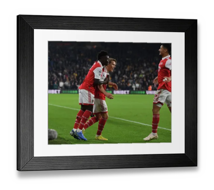 Framed Print : Martin Odegaard's Stunner: Arsenal's Winning Start at Wolverhampton Wanderers (2022-23)