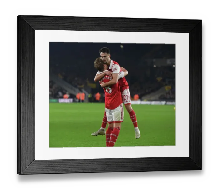 Framed Print : Martin Odegaard and Fabio Vieira Celebrate Arsenal's First Goal vs. Wolverhampton Wanderers (2022-23)