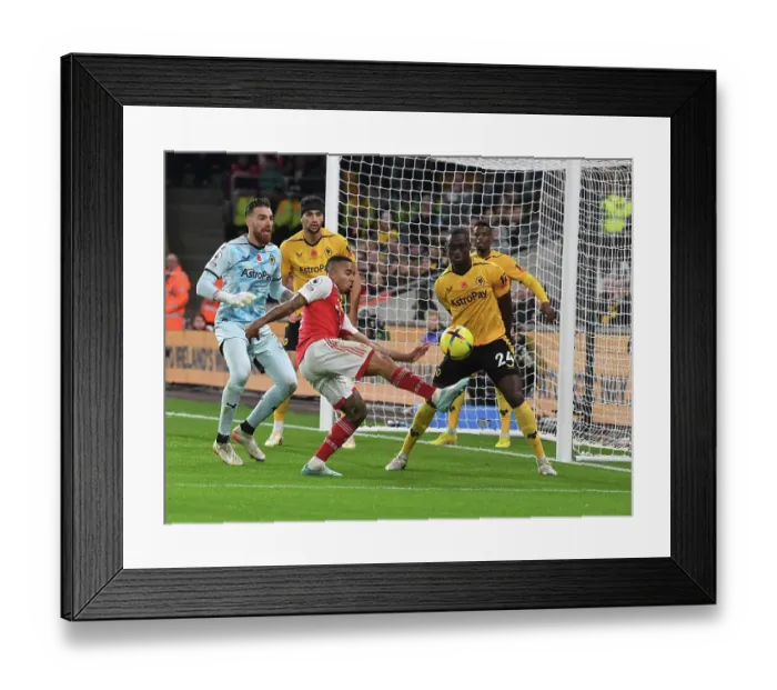 Framed Print : Gabriel Jesus Faces Off Against Wolves Defense in Arsenal's Premier League Clash Framed Print : Gabriel Jesus Faces Off Against Wolves Defense in Arsenal's Premier League Clash
