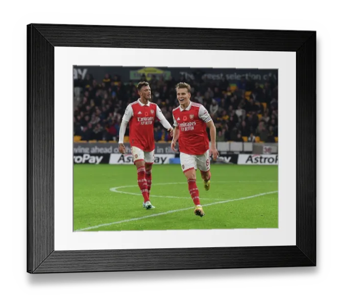 Framed Print : Martin Odegaard and Ben White: Dynamic Duo Delivers Winning Goals for Arsenal Against Wolverhampton Wanderers (2022-23)