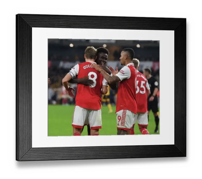 Framed Print : Martin Odegaard and Bukayo Saka Celebrate Arsenal's Goals Against Wolverhampton Wanderers in 2022-23 Premier League
