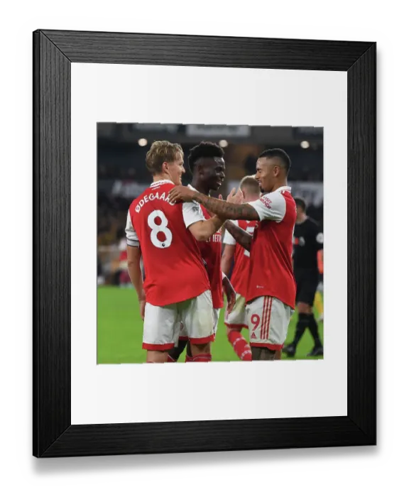 Framed Print : Arsenal's Odegaard and Saka: Celebrating Goals in Style against Wolverhampton Wanderers (2022-23)