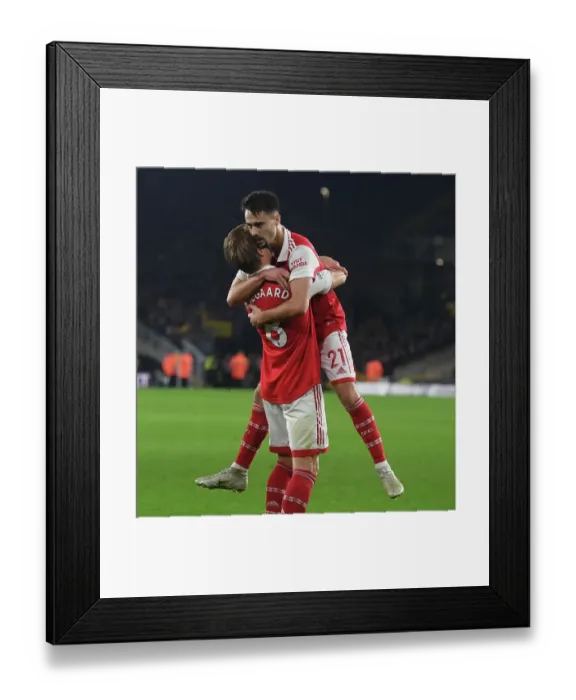 Framed Print : Martin Odegaard and Fabio Vieira Celebrate First Arsenal Goal vs. Wolverhampton Wanderers (2022-23)