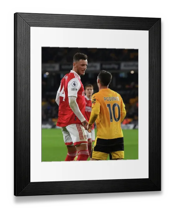 Framed Print : Arsenal vs. Wolverhampton Wanderers: Intense Moment Between Ben White and Daniel Podence
