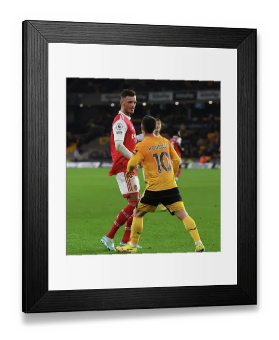 Framed Print : Intense Rivalry: Ben White vs. Daniel Podence Clash in Arsenal vs. Wolverhampton Premier League Showdown (November 2022)