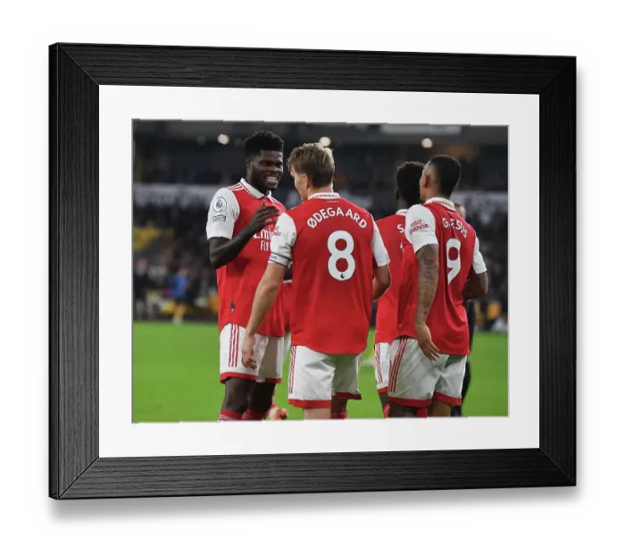 Framed Print : Martin Odegaard and Thomas Partey Celebrate Arsenal's Goals Against Wolverhampton Wanderers (2022-23) Framed Print : Martin Odegaard and Thomas Partey Celebrate Arsenal's Goals Against Wolverhampton Wanderers (2022-23)