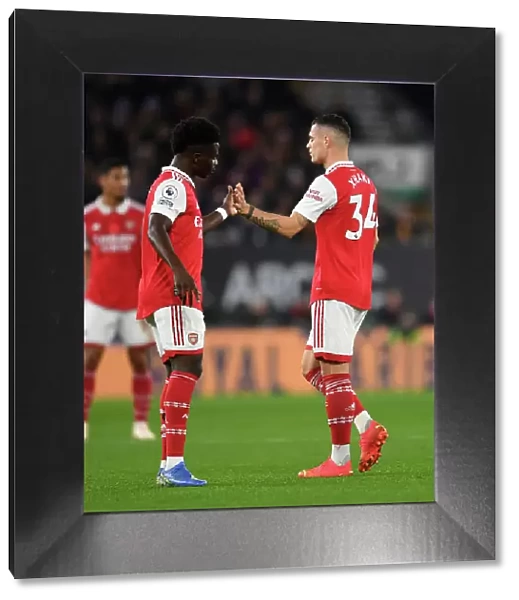 Xhaka and Saka's Heartfelt Moment: Wolverhampton Wanderers vs. Arsenal FC, Premier League 2022-23
