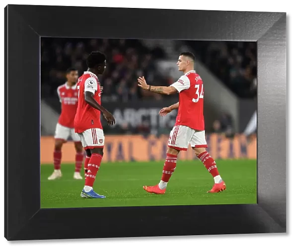 Xhaka and Saka's Heartwarming Moment: Wolverhampton Wanderers vs. Arsenal FC, Premier League 2022-23