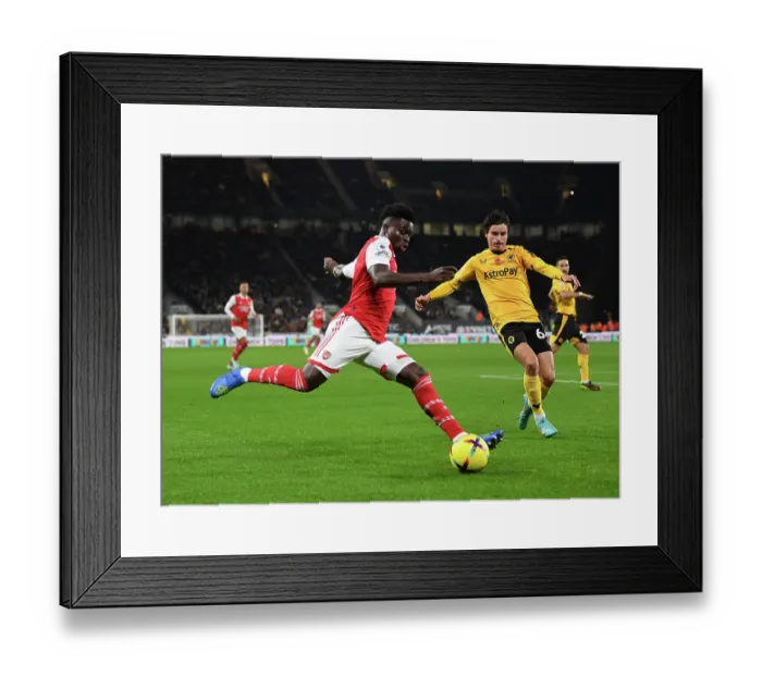 Framed Print : Bukayo Saka's Star Performance: Arsenal Triumphs Over Wolverhampton Wanderers in the Premier League 2022-23 Framed Print : Bukayo Saka's Star Performance: Arsenal Triumphs Over Wolverhampton Wanderers in the Premier League 2022-23