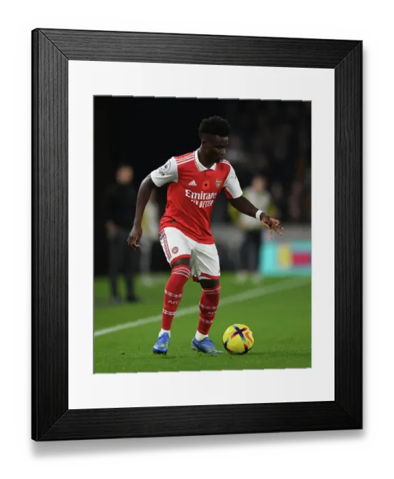 Framed Print : Bukayo Saka's Brilliant Performance: Wolverhampton Wanderers vs. Arsenal FC, Premier League 2022-23