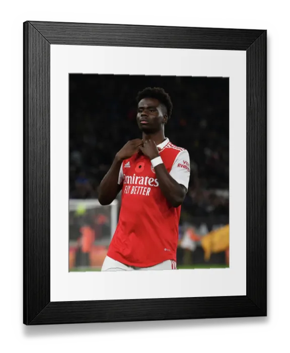 Framed Print : Bukayo Saka Gears Up: Wolverhampton Wanderers vs Arsenal FC, Premier League 2022-23