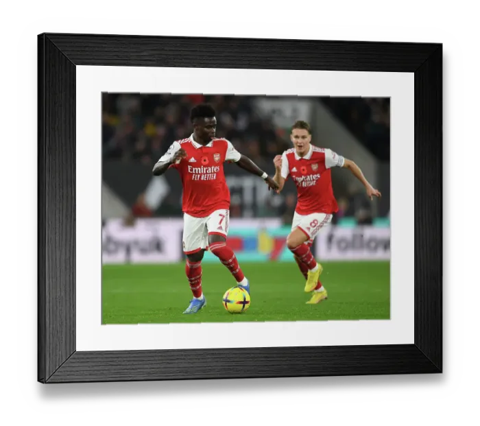 Framed Print : Bukayo Saka's Star Performance: Arsenal Triumphs Over Wolverhampton Wanderers in the Premier League 2022-23