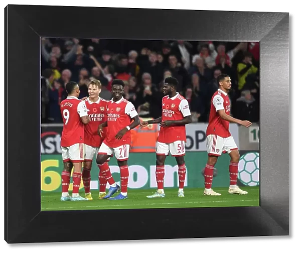 Martinelli, Odegaard, Jesus, Saka, and Partey Celebrate Arsenal's Goals Against Wolverhampton Wanderers (2022-23)