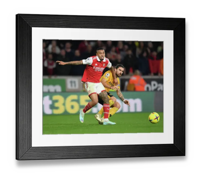 Framed Print : Gabriel Jesus vs Ruben Neves: Intense Battle in Wolverhampton Wanderers vs Arsenal FC Premier League Clash