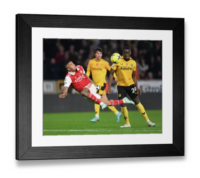 Framed Print : Gabriel Jesus vs. Toti: Intense Clash between Wolverhampton Wanderers and Arsenal FC in the Premier League