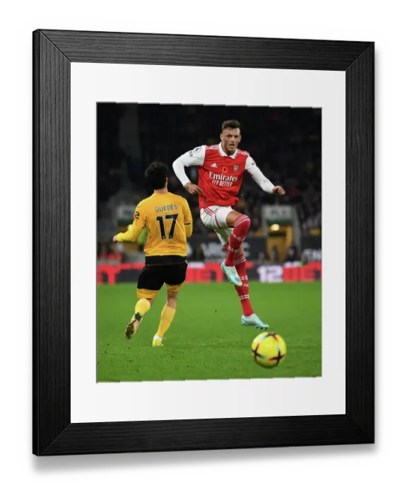 Framed Print : Arsenal's Ben White Fends Off Wolves Goncalo Guedes Pressure in Premier League Clash (Wolverhampton Wanderers vs Arsenal 2022-23)
