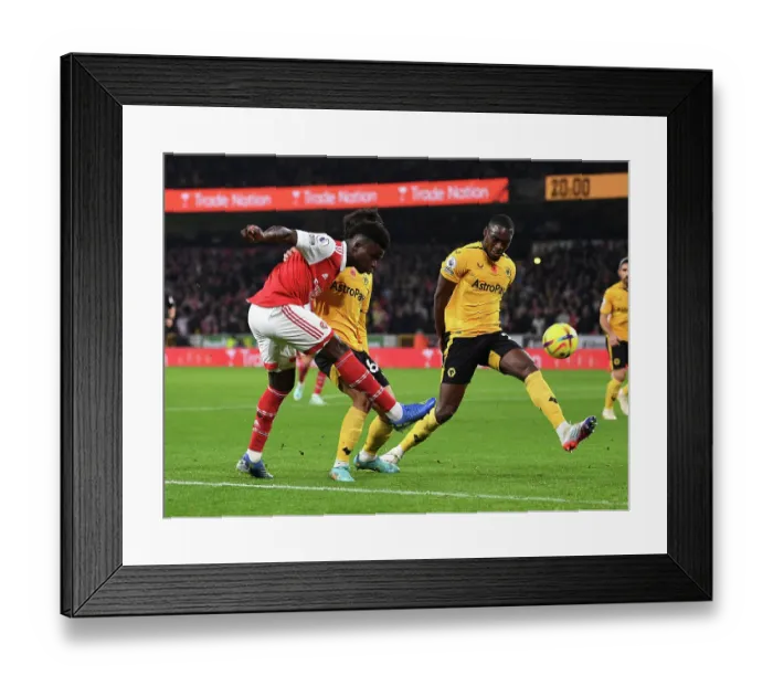 Framed Print : Bukayo Saka Faces Off Against Toti: Wolverhampton Wanderers vs. Arsenal FC, Premier League 2022-23 Framed Print : Bukayo Saka Faces Off Against Toti: Wolverhampton Wanderers vs. Arsenal FC, Premier League 2022-23