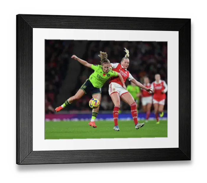 Framed Print : Arsenal vs Manchester United: FA Women's Super League Clash at Emirates Stadium - A Battle Between Stina Blackstenius and Maya Le Tissier