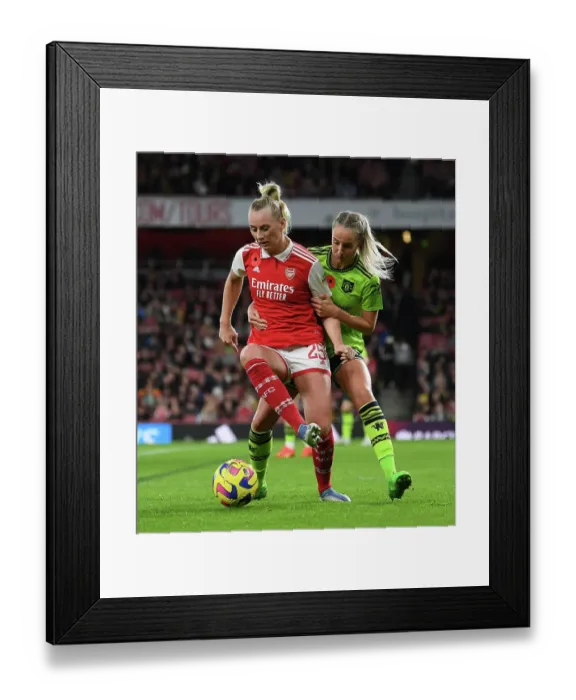Framed Print : Arsenal vs Manchester United: FA Women's Super League Clash at Emirates Stadium (2022-23) - Stina Blackstenius vs Mille Turner Tussle