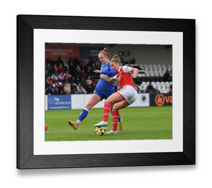 Framed Print : Arsenal's Vivianne Miedema Outmaneuvers Everton's Karen Holmgaard in FA Women's Super League Clash Framed Print : Arsenal's Vivianne Miedema Outmaneuvers Everton's Karen Holmgaard in FA Women's Super League Clash