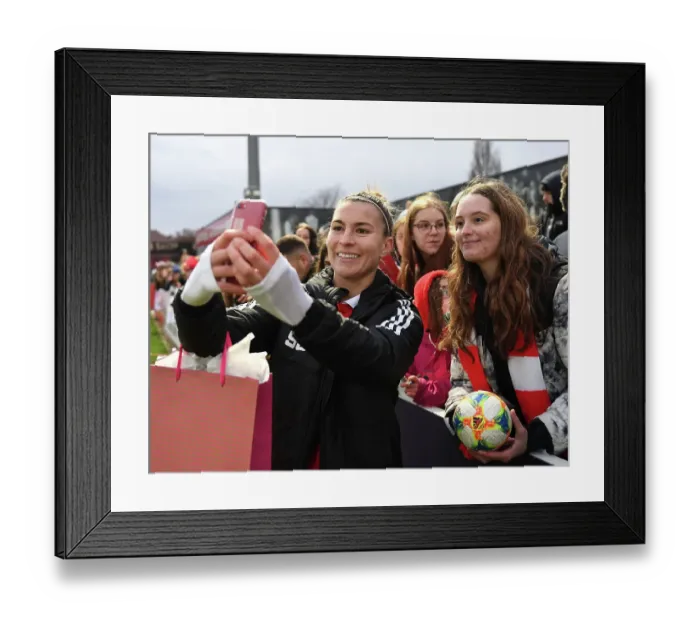 Framed Print : Arsenal Women's Steph Catley Celebrates with Fan after Triumph over Everton at Meadow Park