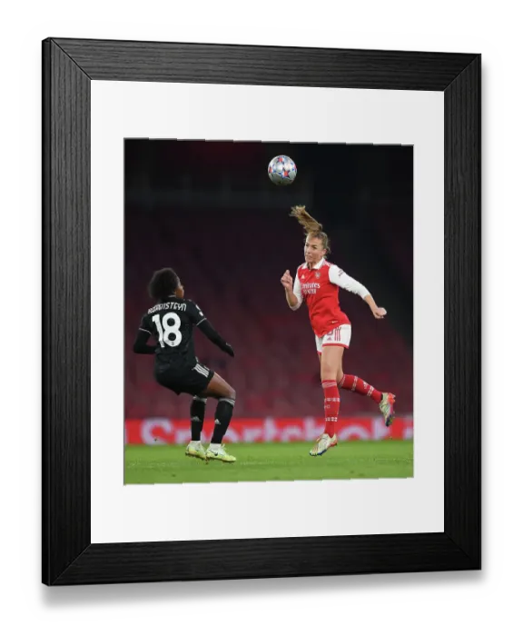 Framed Print : Arsenal WFC vs Juventus FC: Clash in the UEFA Women's Champions League - Lia Walti Heads the Ball Clear Framed Print : Arsenal WFC vs Juventus FC: Clash in the UEFA Women's Champions League - Lia Walti Heads the Ball Clear