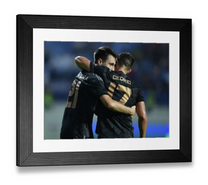 Framed Print : Arsenal Triumphs over Olympique Lyonnais in Dubai Super Cup: Fabio Vieira's Hat-trick