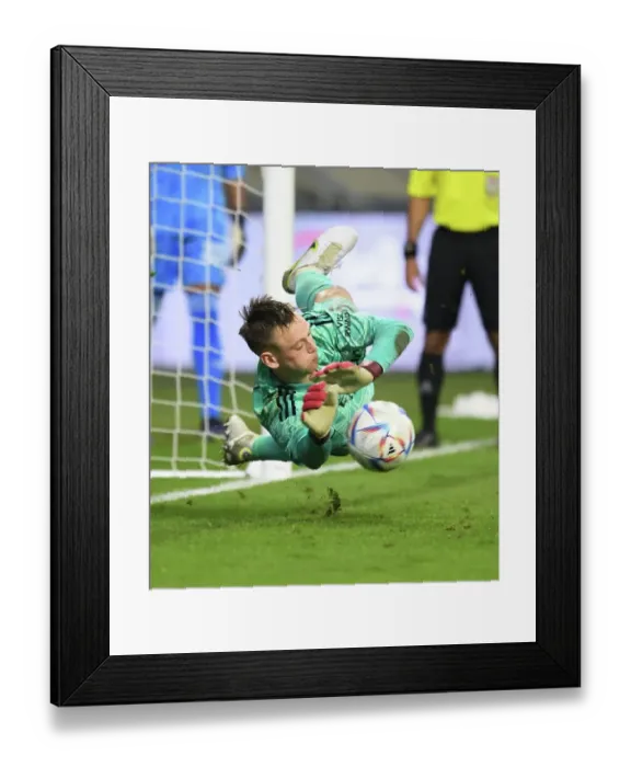 Framed Print : Arsenal's Karl Hein Heroics: Penalty Save Secures Dubai Super Cup Victory