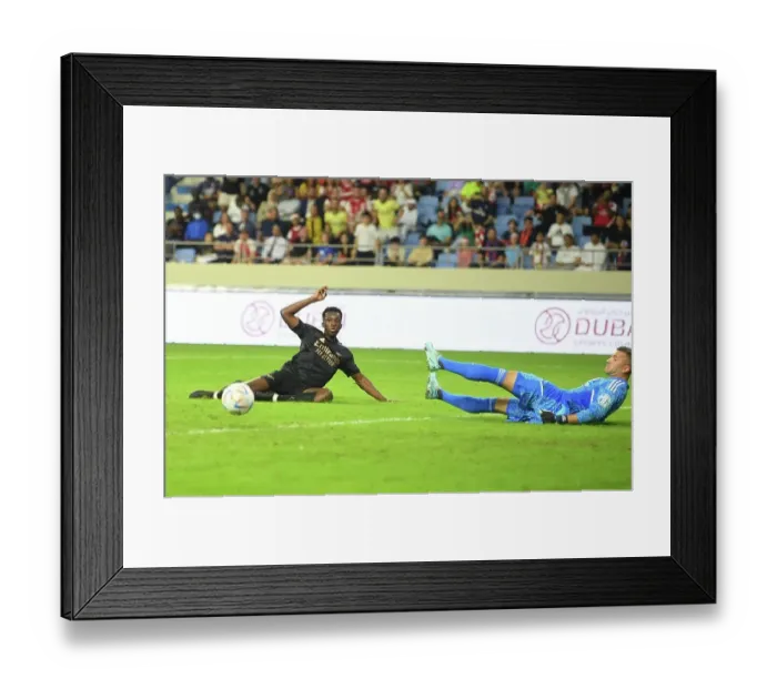 Framed Print : Arsenal's Eddie Nketiah Scores Second Goal in Dubai Super Cup Victory over Olympique Lyonnais Framed Print : Arsenal's Eddie Nketiah Scores Second Goal in Dubai Super Cup Victory over Olympique Lyonnais