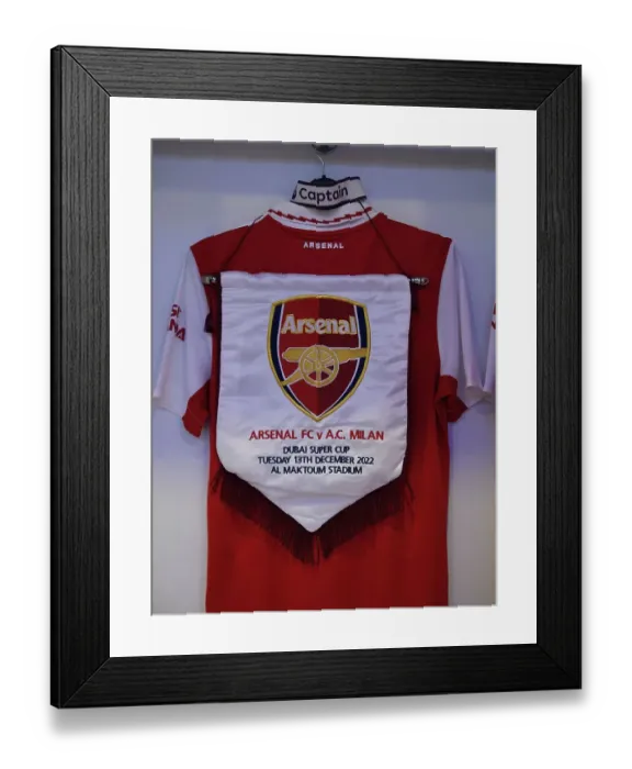 Framed Print : Arsenal FC: Pre-Match Preparations - Odegard's Shirt, Armband, and Pennant in Arsenal Changing Room (Arsenal vs AC Milan 2022-23) Framed Print : Arsenal FC: Pre-Match Preparations - Odegard's Shirt, Armband, and Pennant in Arsenal Changing Room (Arsenal vs AC Milan 2022-23)
