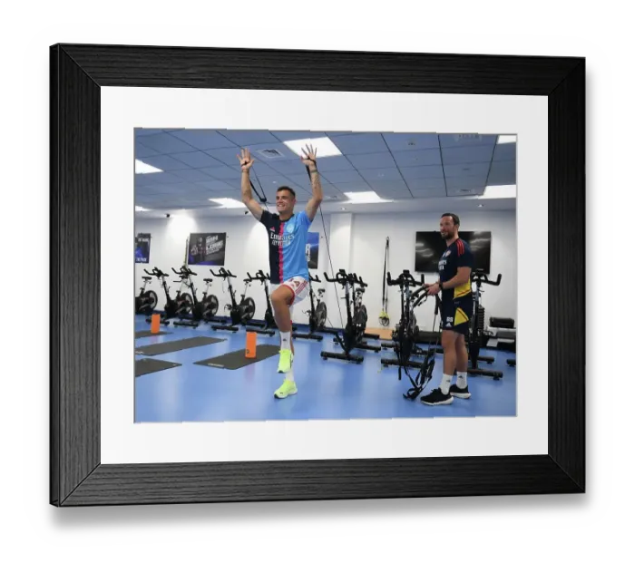 Framed Print : Arsenal FC: Granit Xhaka's Pre-Match Training with Barry Solan before Arsenal vs AC Milan, Dubai Super Cup 2022-23