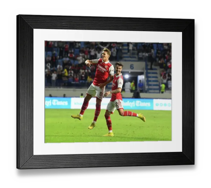 Framed Print : Arsenal's Odegaard and Vieira Celebrate First Goals Against AC Milan at Dubai Super Cup, 2022-23 Framed Print : Arsenal's Odegaard and Vieira Celebrate First Goals Against AC Milan at Dubai Super Cup, 2022-23