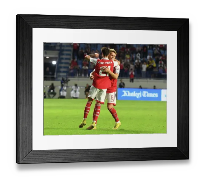 Framed Print : Arsenal vs AC Milan: Martin Odegaard and Fabio Vieira Celebrate Goal at Dubai Super Cup