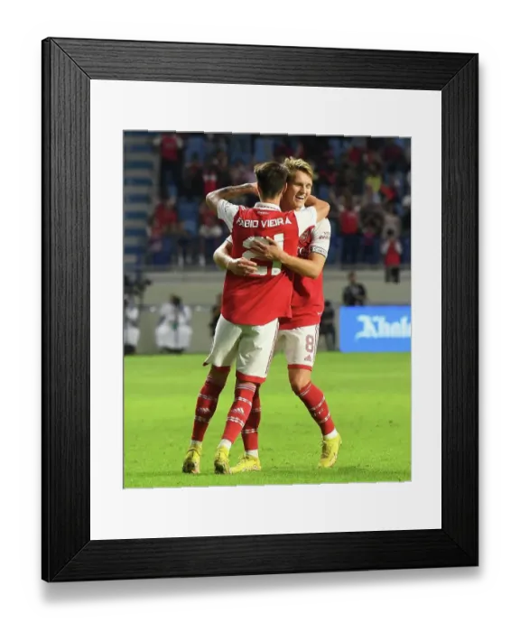 Framed Print : Arsenal's Odegaard and Vieira Celebrate Goal Against AC Milan at Dubai Super Cup