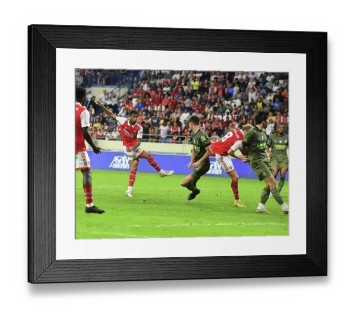 Framed Print : Reiss Nelson Scores as Arsenal Triumphs in Dubai Super Cup over AC Milan