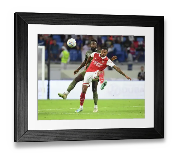 Framed Print : Arsenal vs AC Milan Clash: Gabriel vs Origi in Dubai, 2022-23