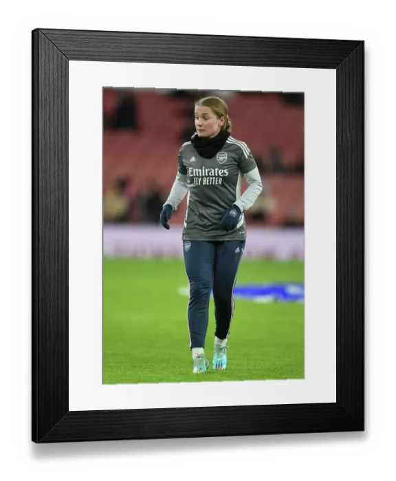 Framed Print : Arsenal FC: Kim Little's Unwavering Focus in the Changing Room Before Arsenal Women vs Olympique Lyonnais - UEFA Women's Champions League (2022-23)