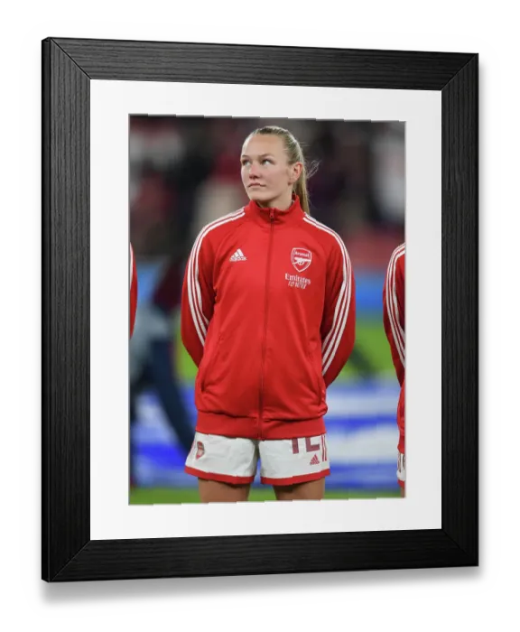 Framed Print : Arsenal FC: Kim Little's Steadfast Determination in the Changing Room Before Arsenal vs. Olympique Lyonnais, UEFA Women's Champions League 2022-23