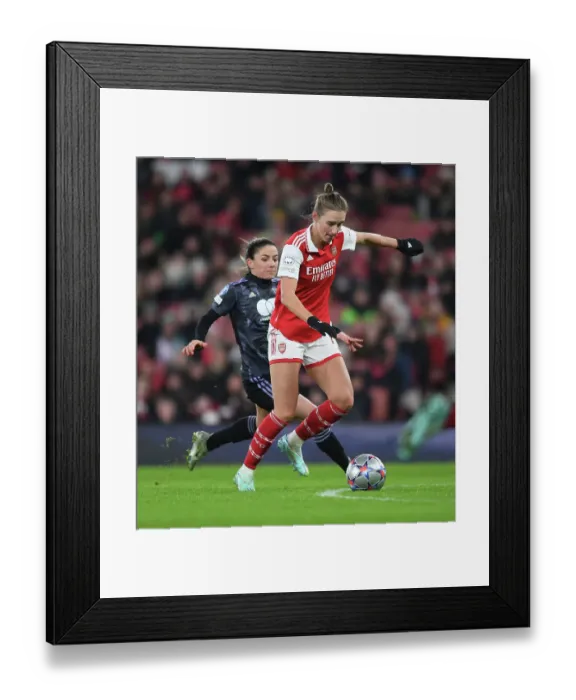 Framed Print : Arsenal FC: Kim Little's Focus and Determination Before UEFA Champions League Match against Olympique Lyonnais
