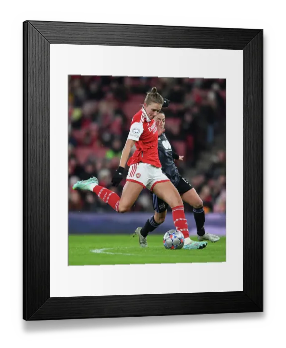Framed Print : Arsenal FC: Kim Little's Unwavering Focus Before UEFA Women's Champions League Match against Olympique Lyonnais