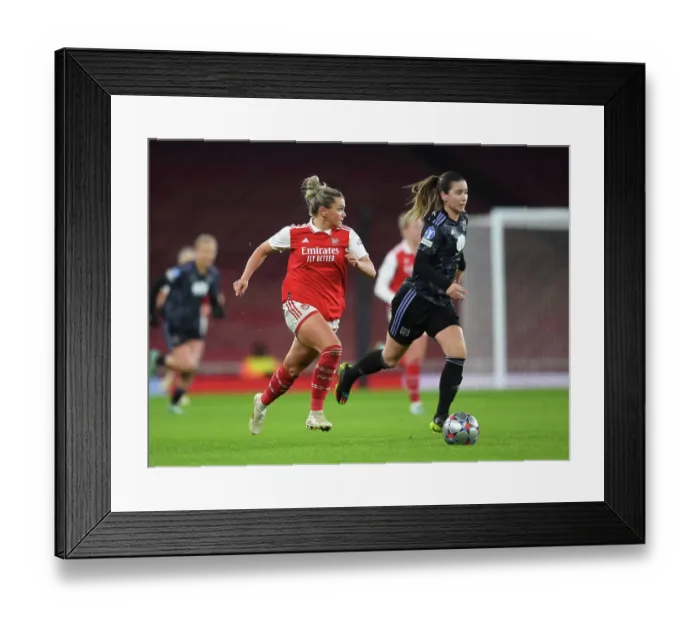 Framed Print : Focus and Determination: Kim Little Prepares for Arsenal vs. Olympique Lyonnais in the UEFA Women's Champions League