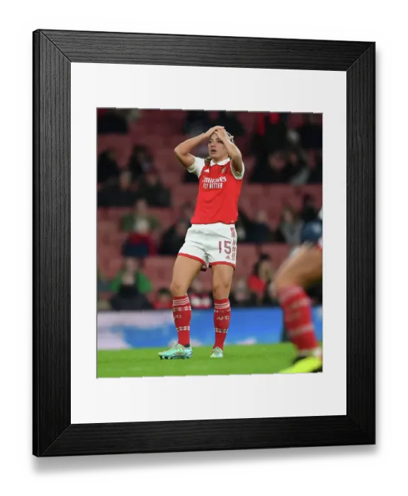 Framed Print : Intense Focus: Kim Little Prepares for Arsenal vs. Olympique Lyonnais in the UEFA Women's Champions League